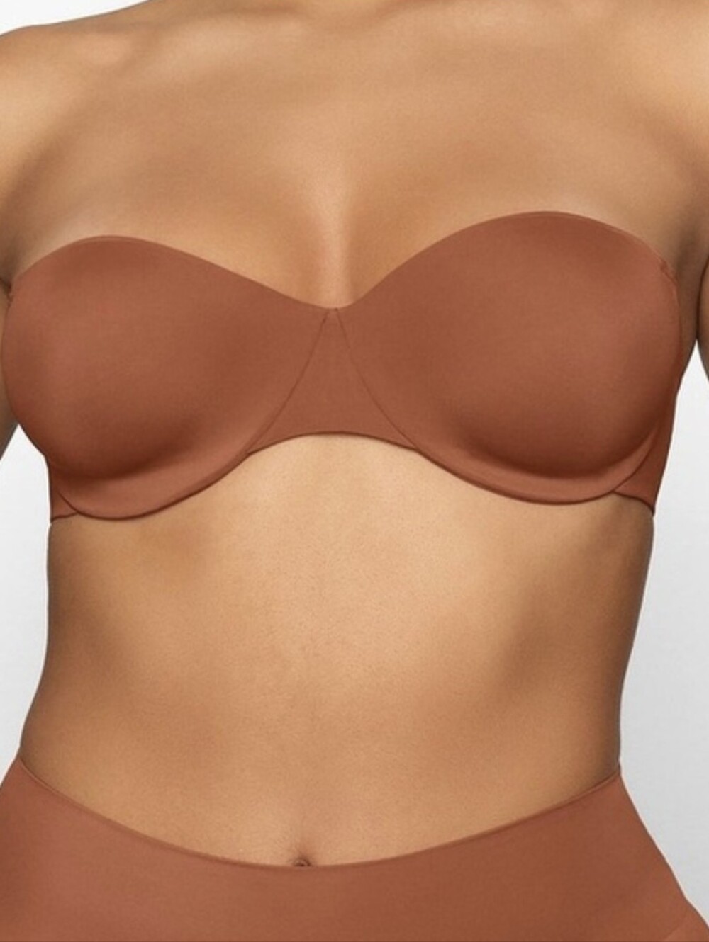 SKIMS Smoothing Intimates Unlined Strapless Bra In Bronze